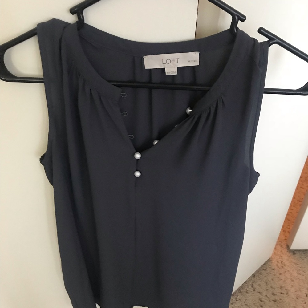 Women’s blouse with pearl buttons